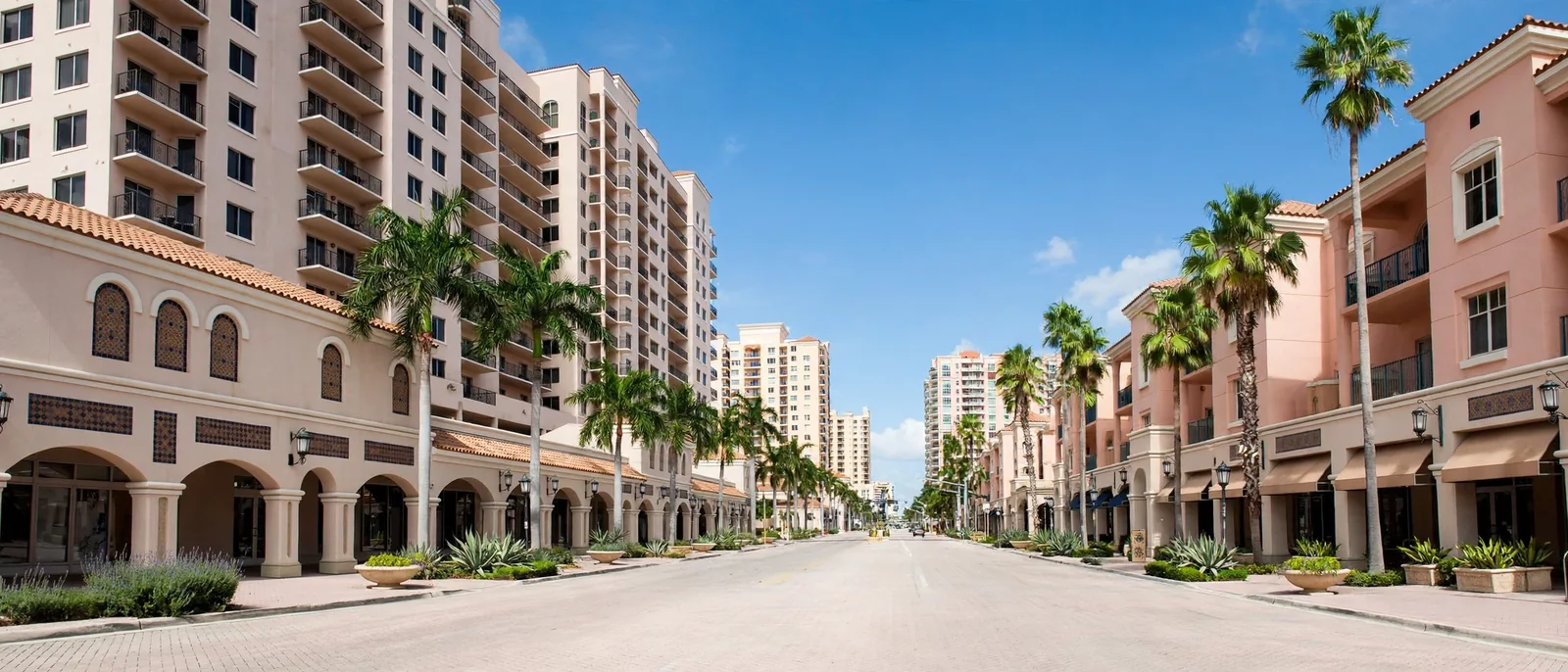 Condominium buildings and palm-lined streets in Downtown Boca Raton near Mizner Park